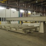K&M Machine Fabricating - Fabricated, Machined, Assembled Base and Gantry for CNC Router for Aerospace Industry